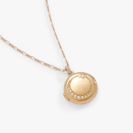a gold locket with diamonds on a chain