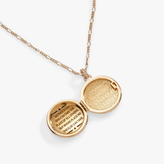 a gold locket on a chain