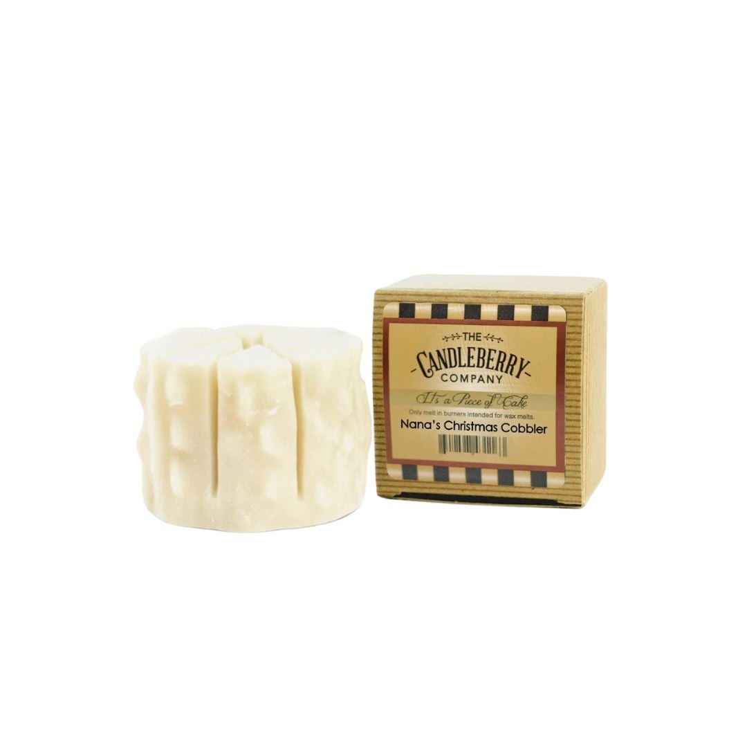 a white candle in a box