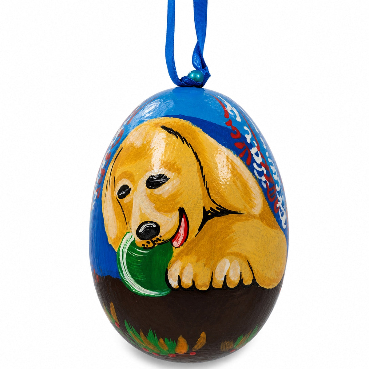 a painted egg with a dog on it