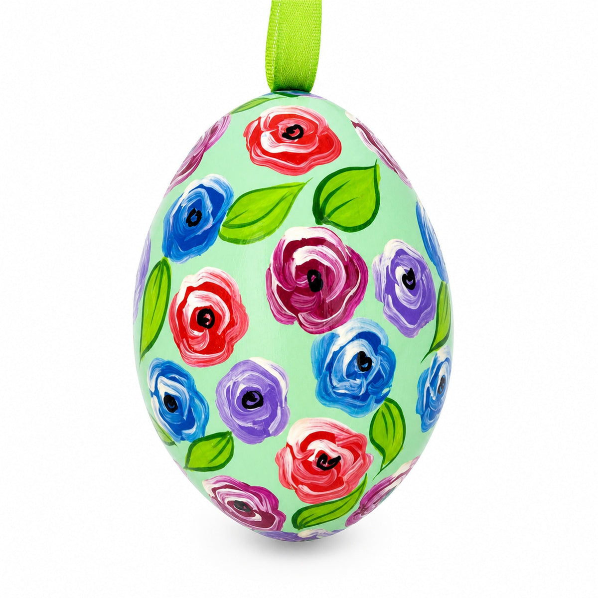 a painted egg with flowers on it