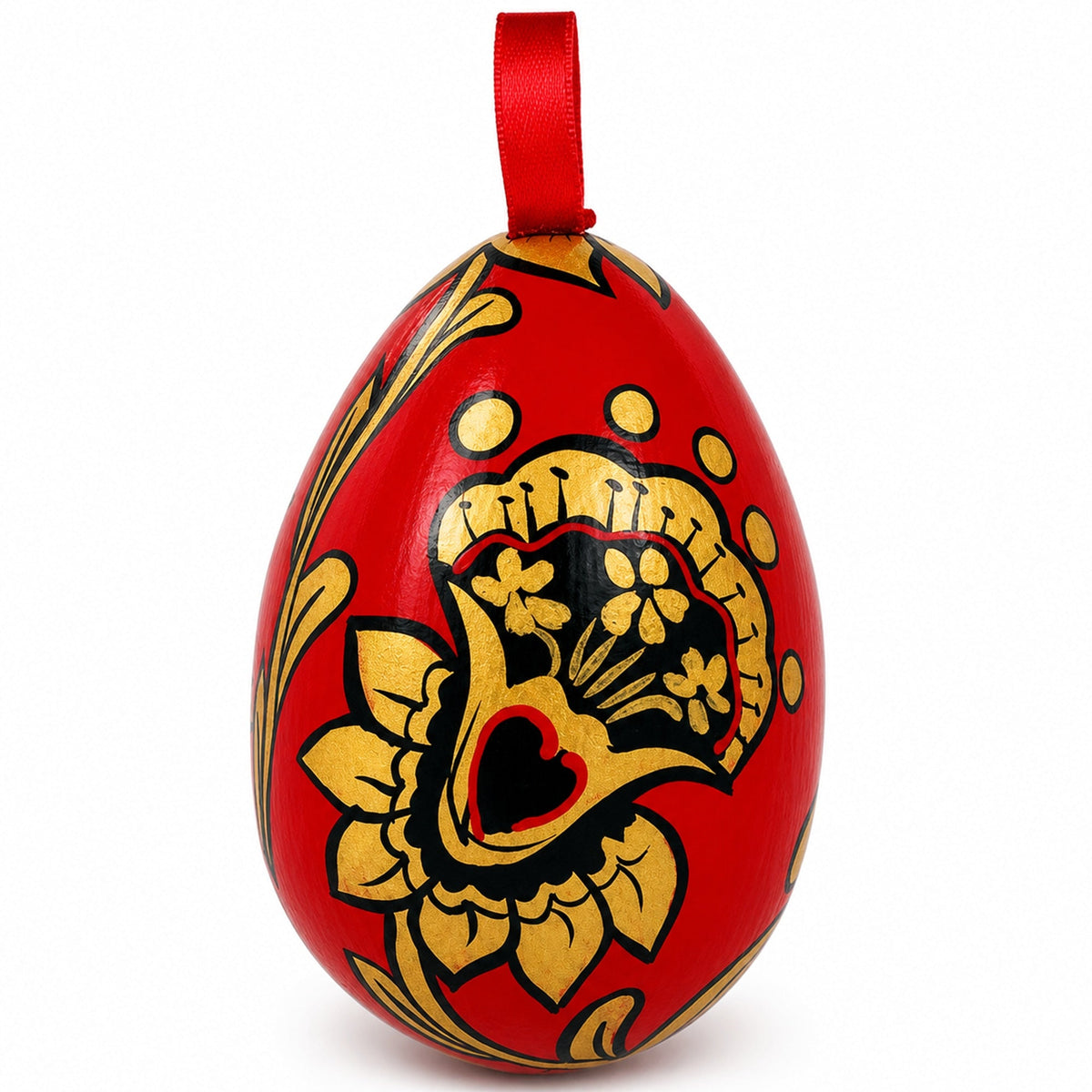 a red and gold decorated egg