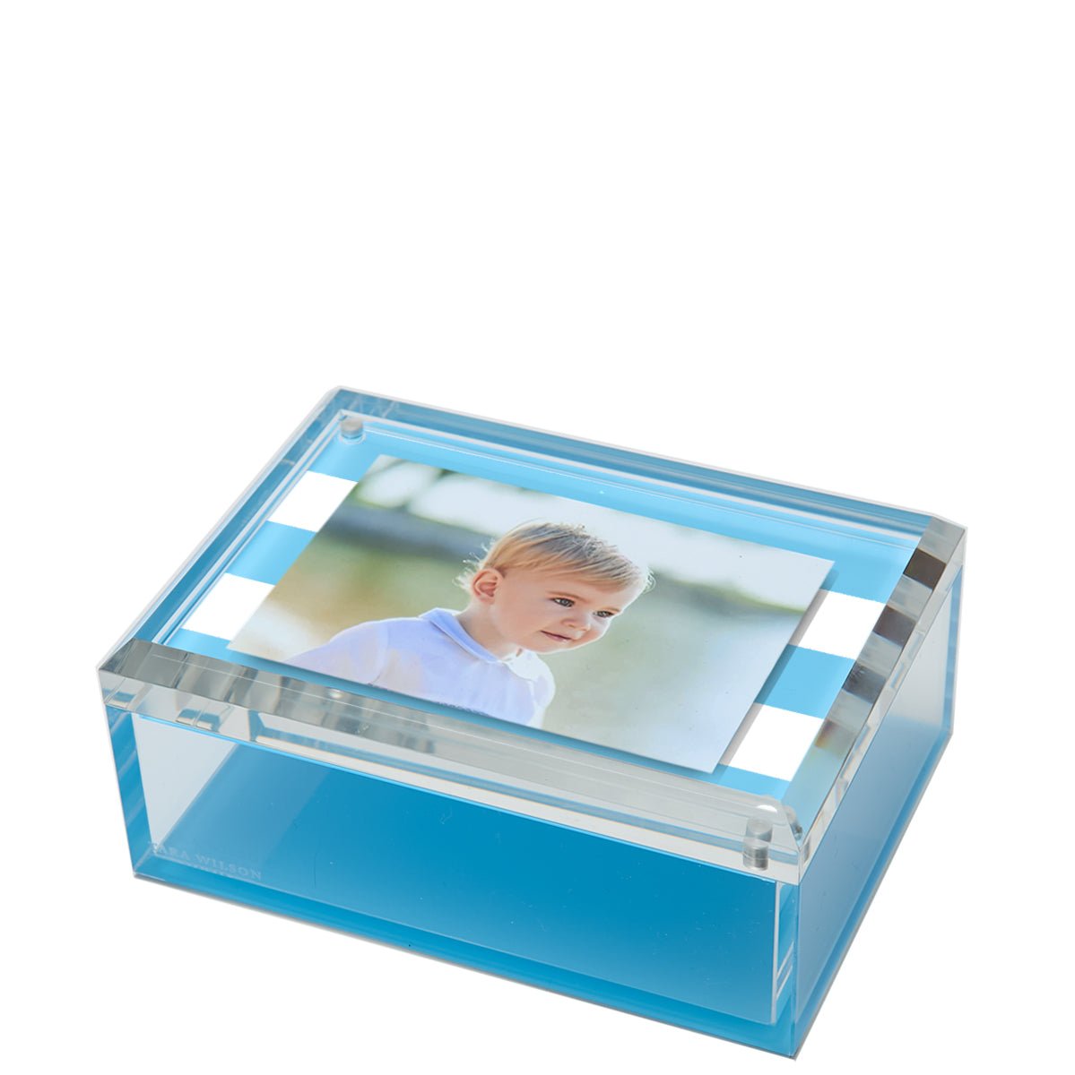 a blue box with a picture of a boy