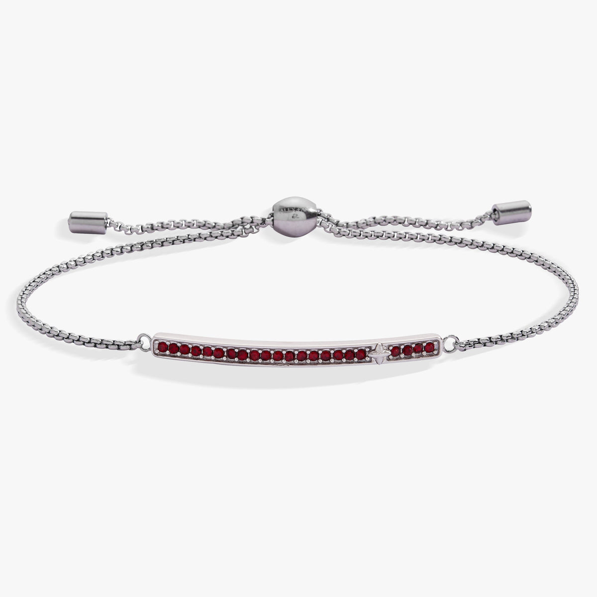 a silver bracelet with red stones