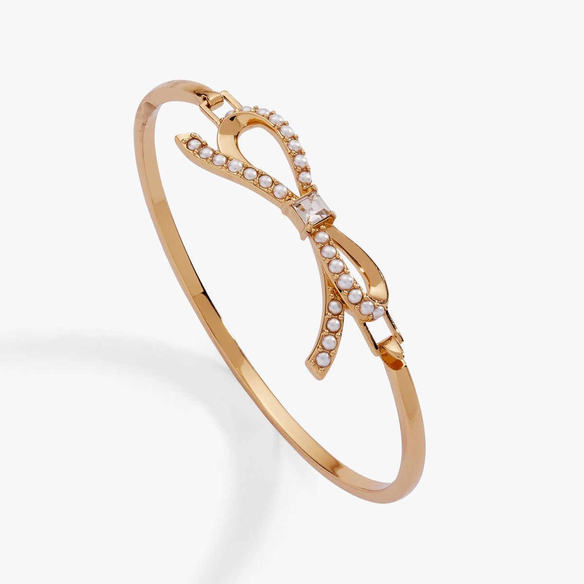 a gold bracelet with diamonds
