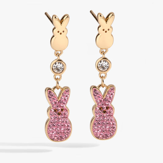 a pair of gold bunny earrings