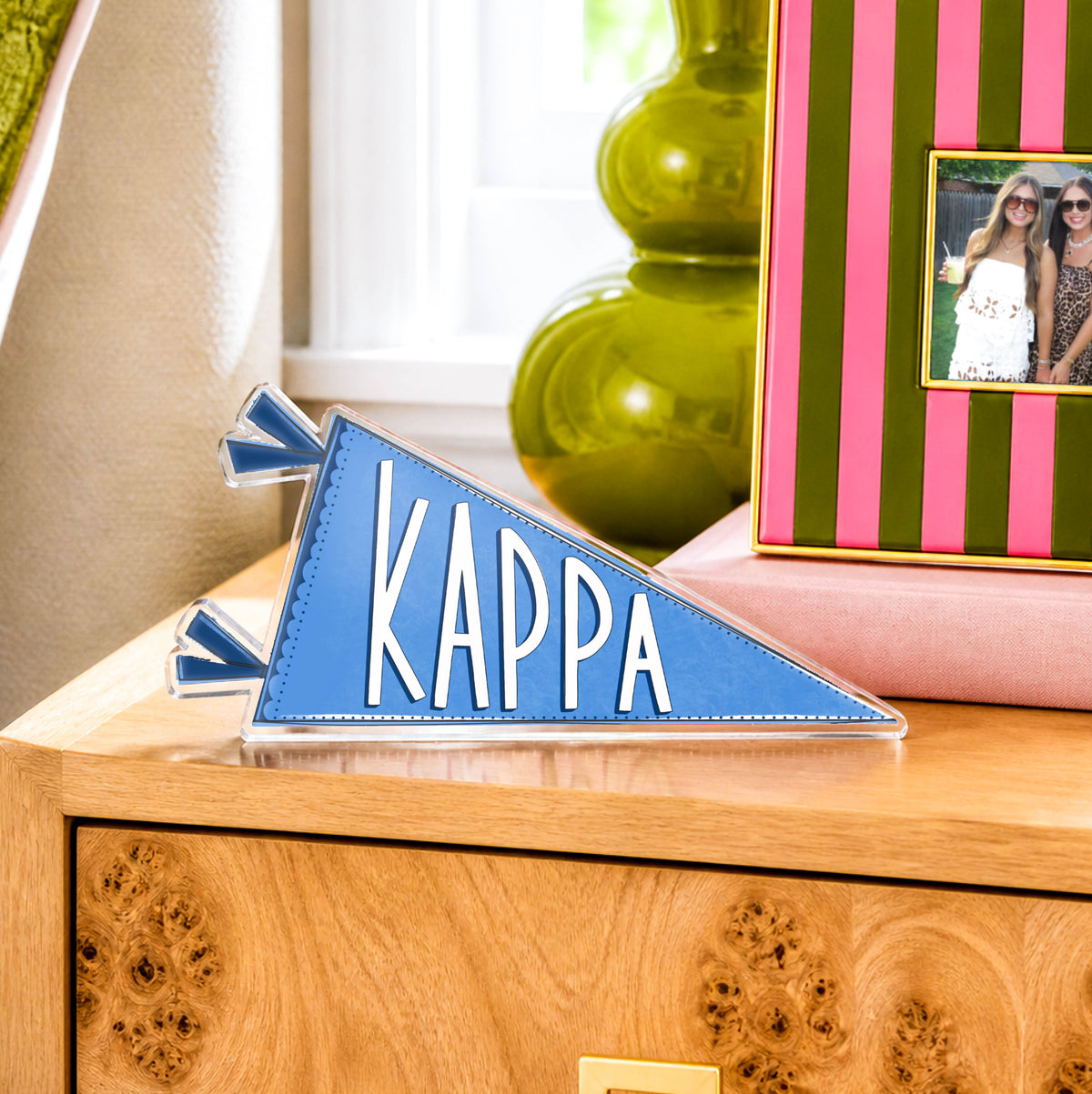 a blue triangle sign on a dresser
