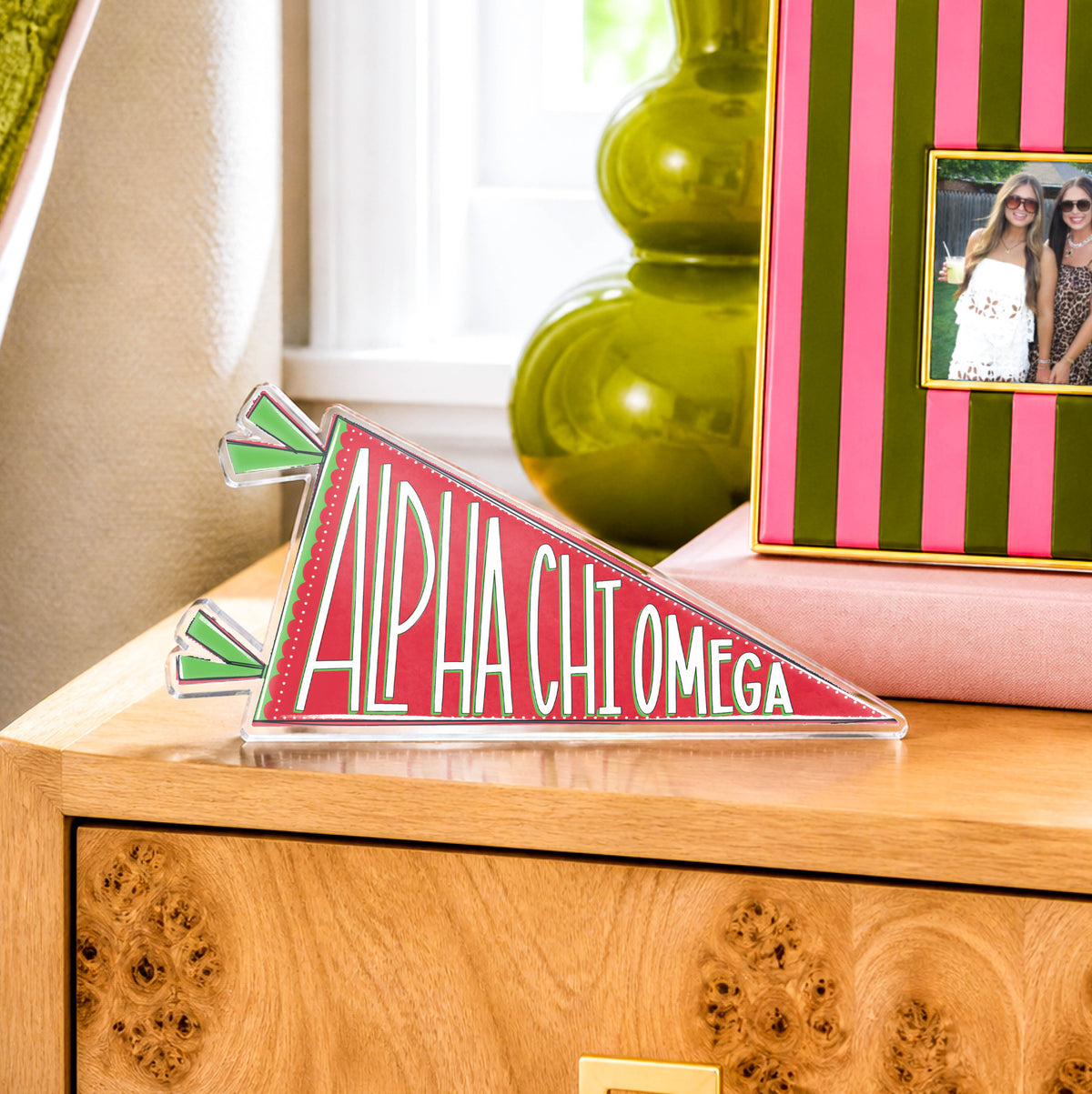a picture frame on a dresser