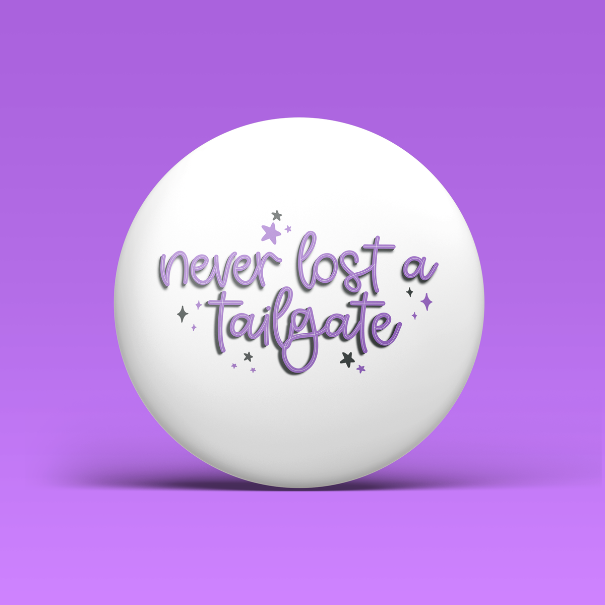 a white ball with purple text