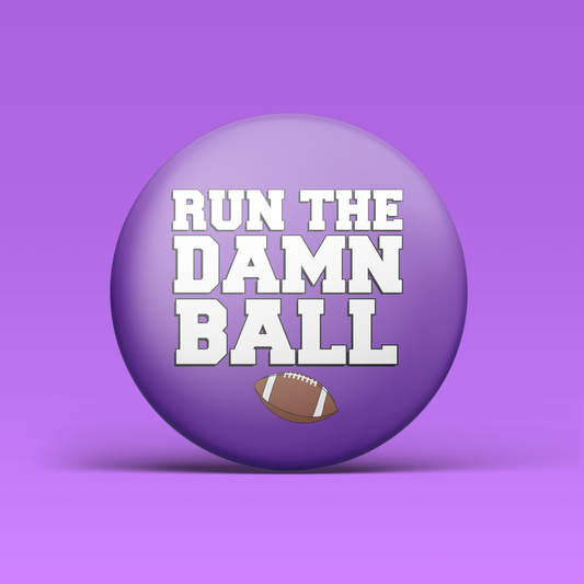 a purple ball with white text and a football