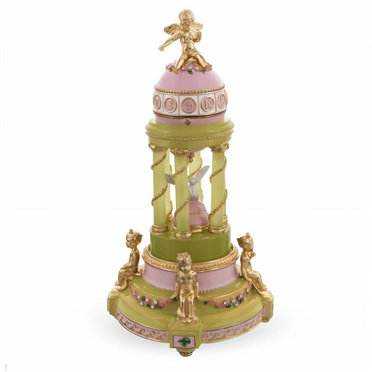 a small statue on top of a tower