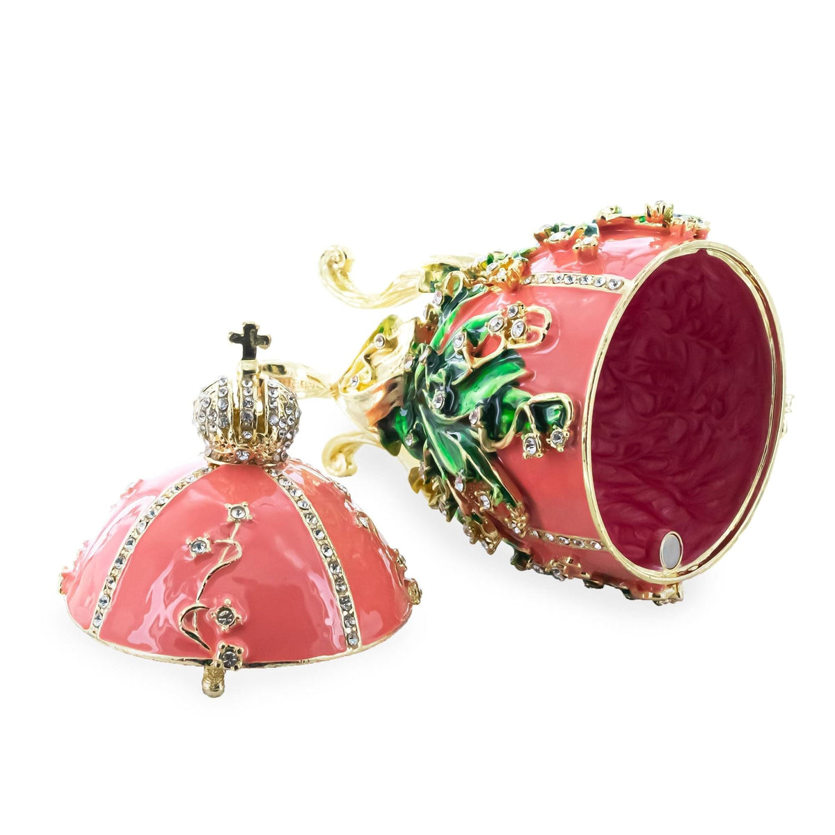 a pink and gold decorated bell