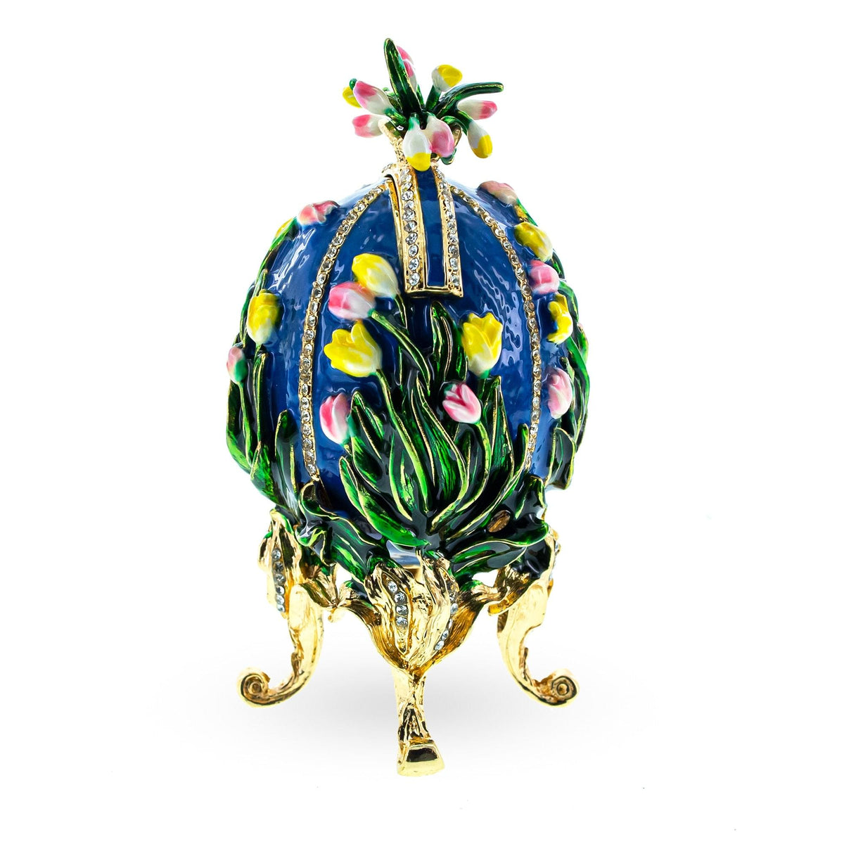 a blue and gold egg shaped object with flowers