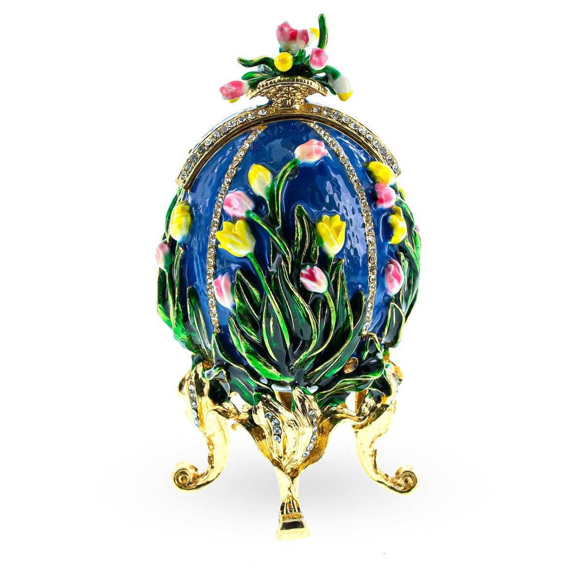 a blue and gold egg shaped object with flowers