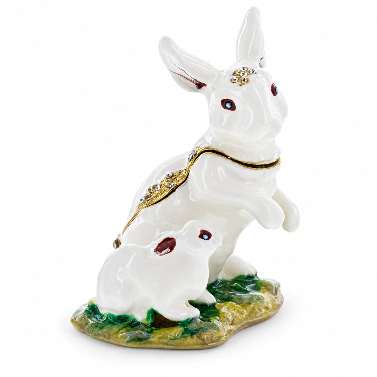 a white rabbit statue with a baby rabbit