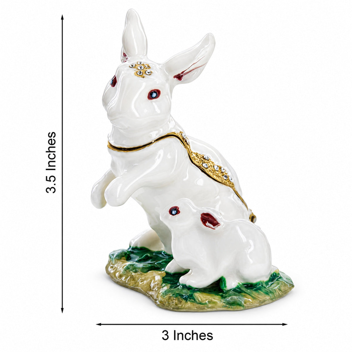 a white rabbit statue with a gold trim and a gold necklace