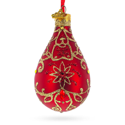 a red and gold ornament
