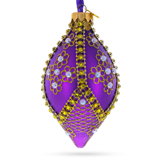 a purple and gold ornament