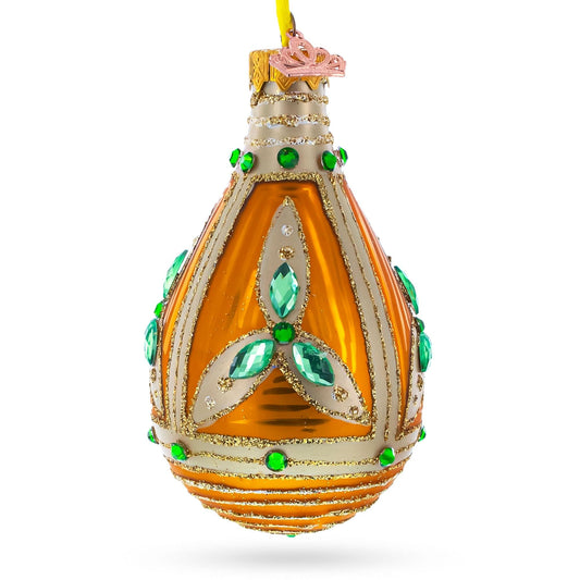 a gold and green ornament