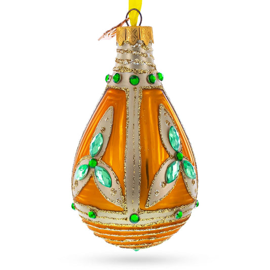 an ornament with green gems