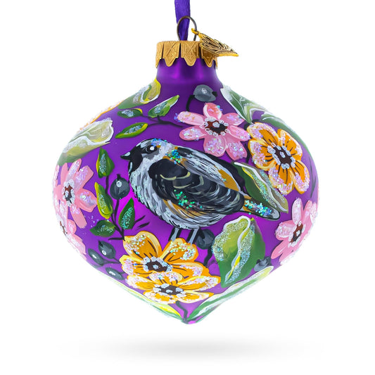 a purple ornament with a bird painted on it