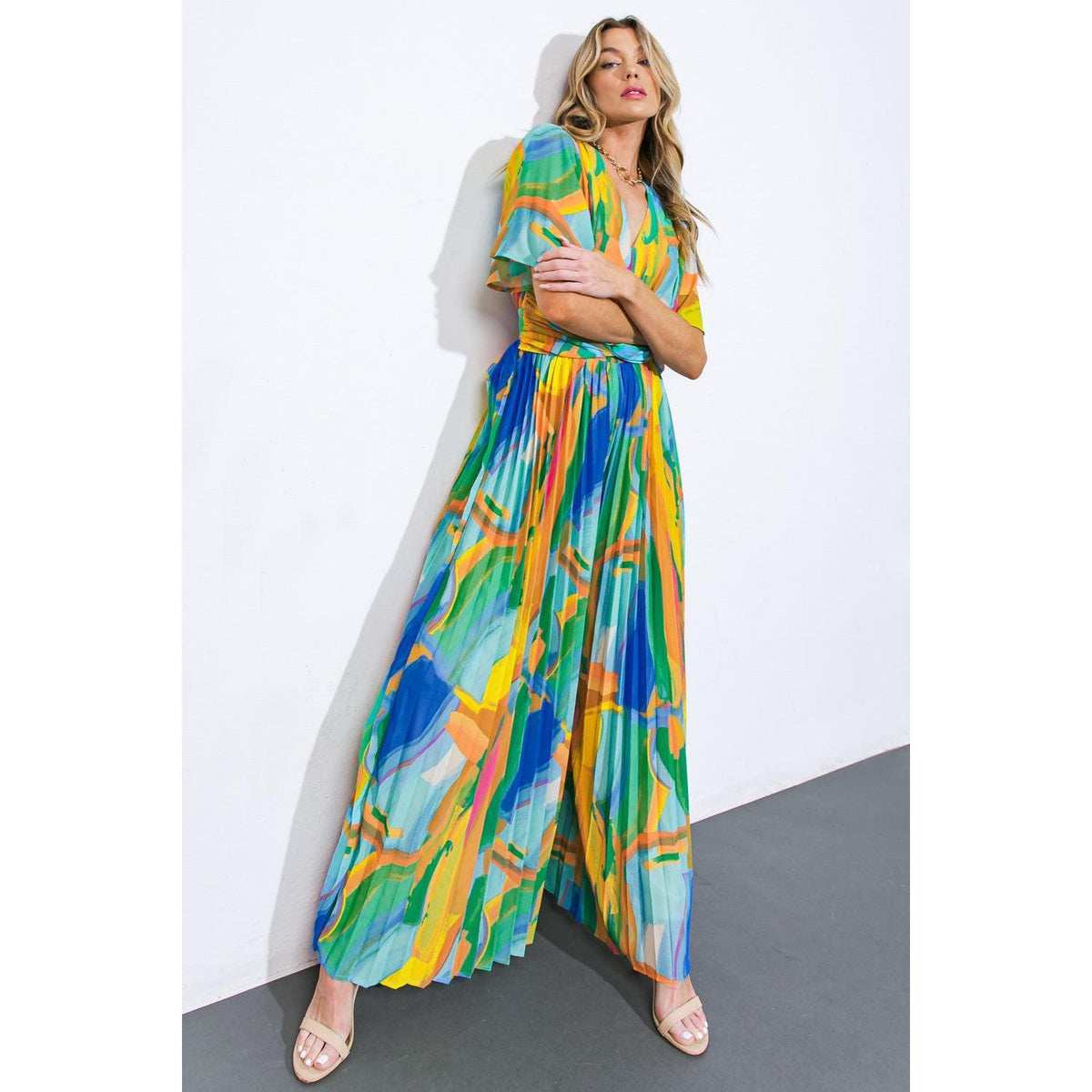 a woman in a colorful dress