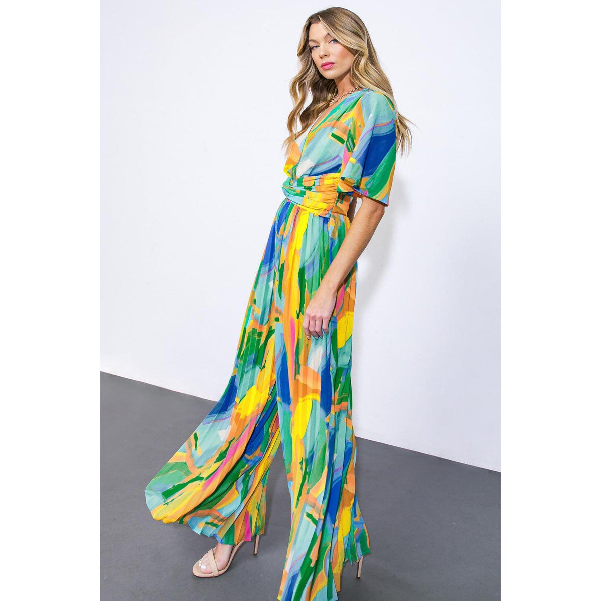a woman in a colorful dress
