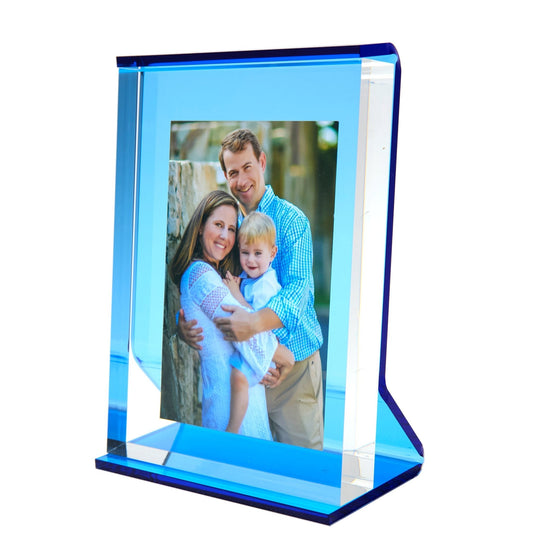a picture of a family in a blue frame