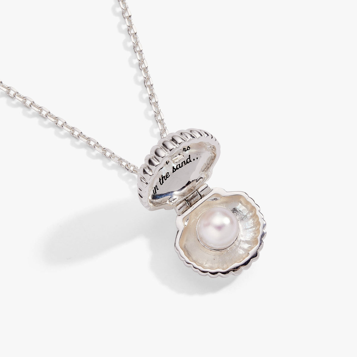 a silver necklace with a pearl in it