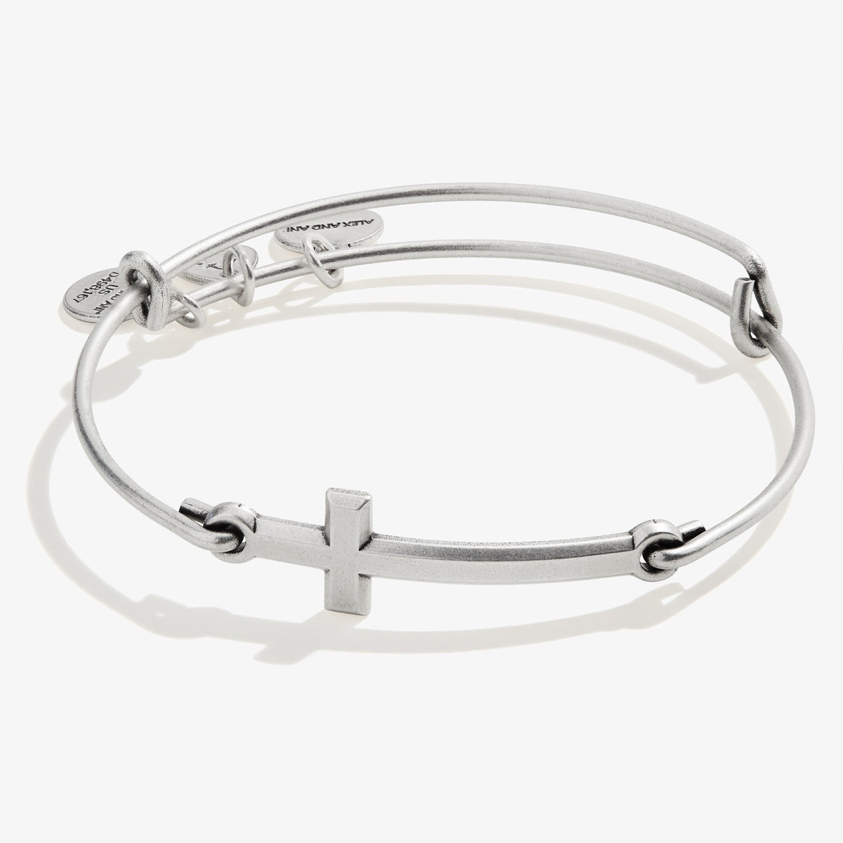 a silver bracelet with a cross on it