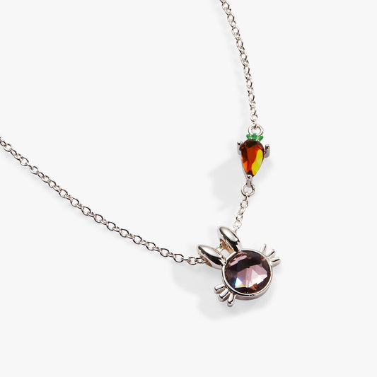 a necklace with a rabbit pendant