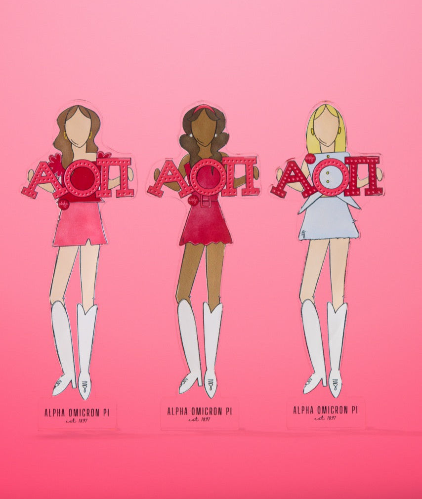 a group of girls holding letters
