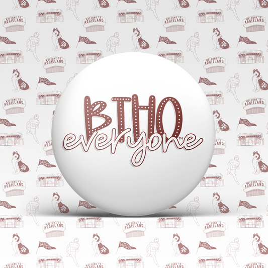 a white ball with red lettering on it