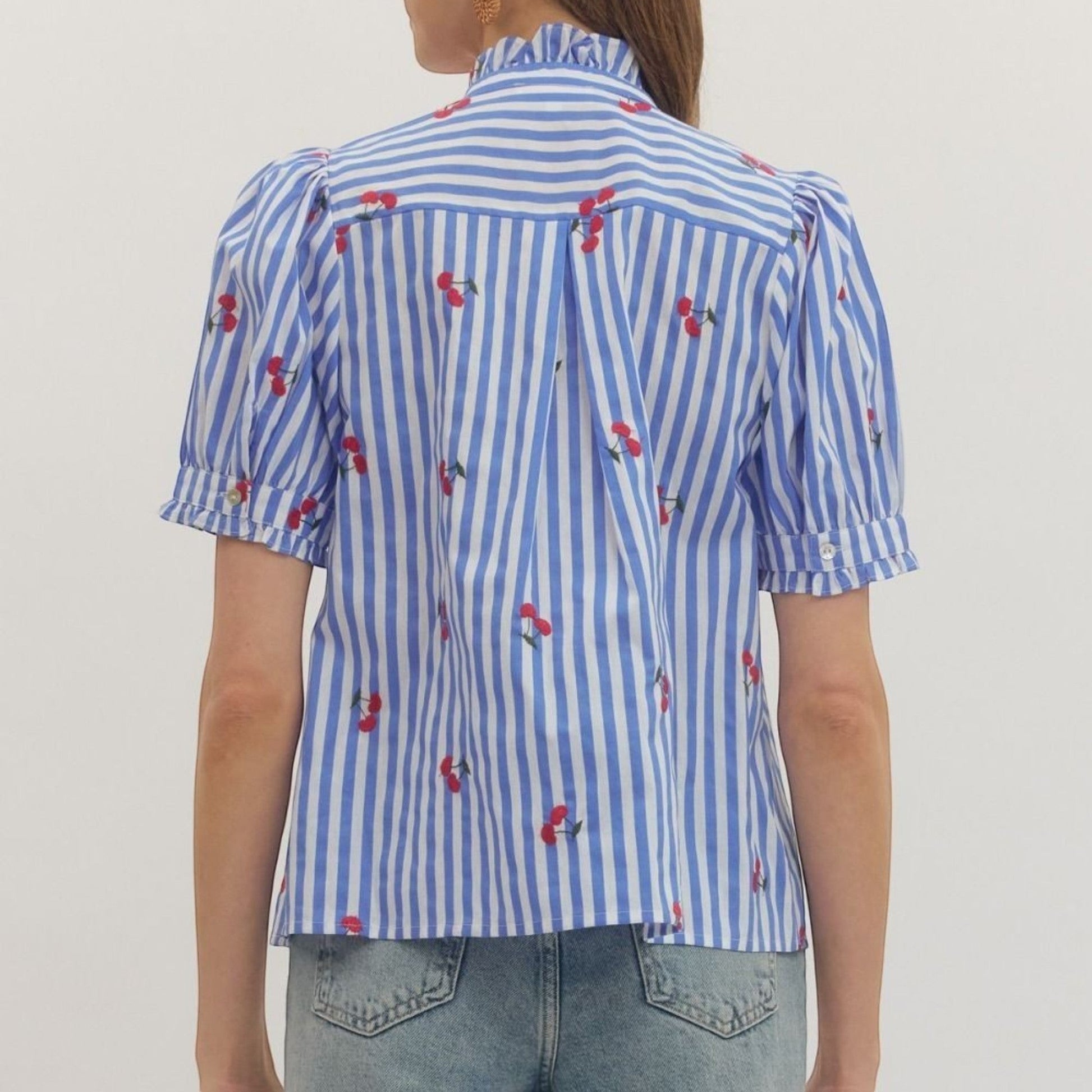 The Merry Hare blue striped cotton blouse with embroidered cherries and puff short sleeves.