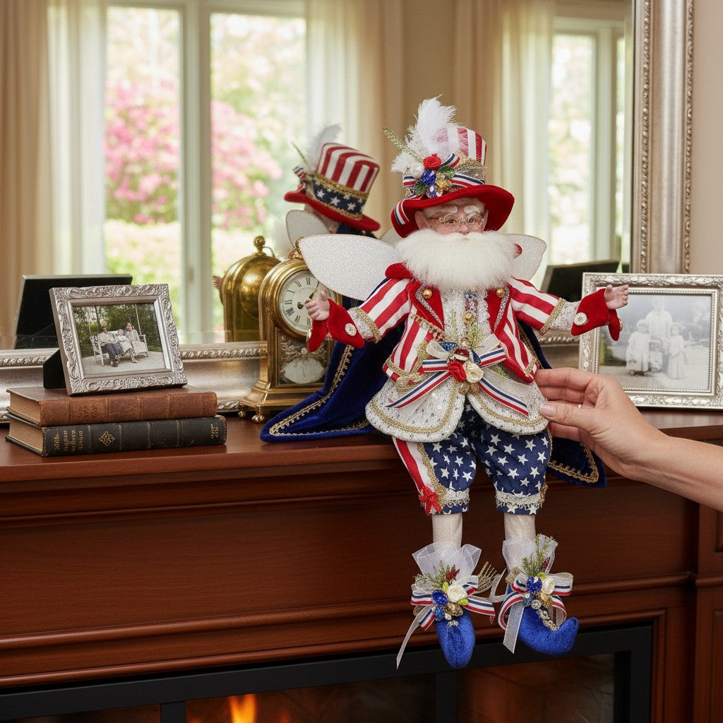 The Merry Hare Let the Freedom Ring Fairy, 18-inch patriotic fairy with Uncle Sam-inspired outfit, red and white stripes, blue stars, and white wings.