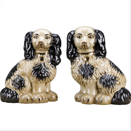 The Merry Hare pair of large Staffordshire Chinoiserie dog figurines in black and cream with gold locket detailing.