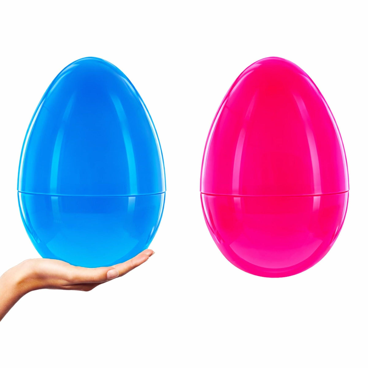 a hand holding a blue and pink egg shaped object
