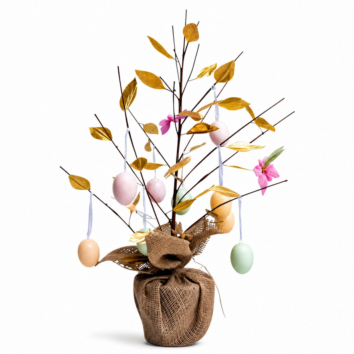 a tree with eggs and flowers