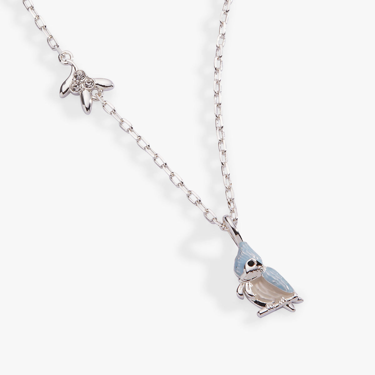 a silver necklace with a blue pendant