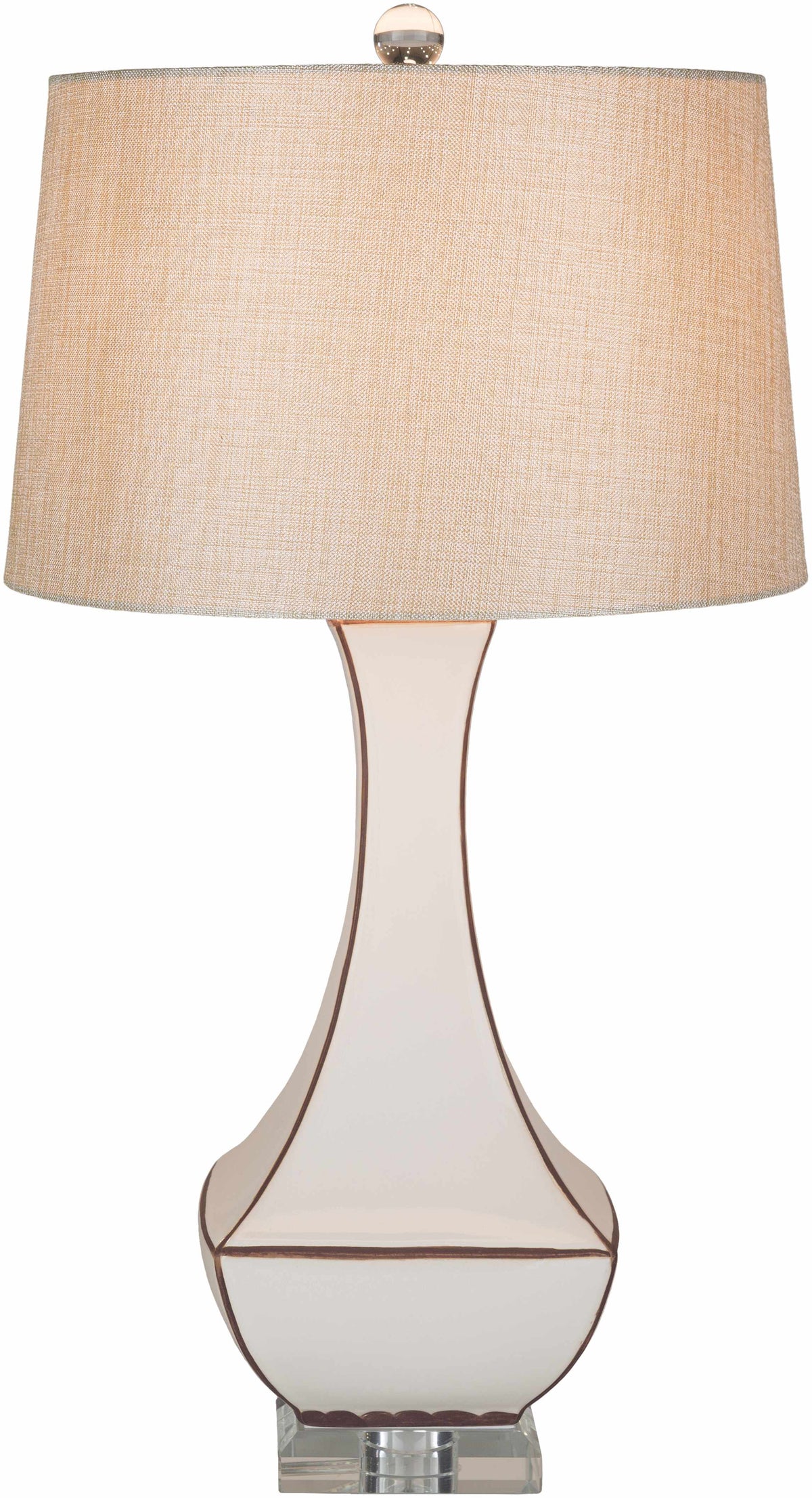 a white lamp with a brown shade