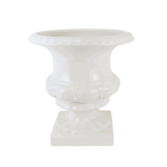 a white vase with a base