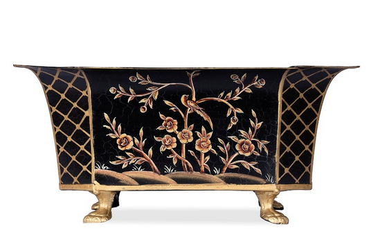 a black and gold painted chest