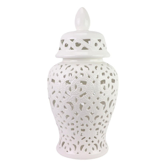 a white vase with a lid