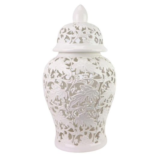 a white vase with a lid
