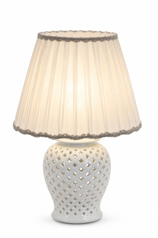 a white lamp with a white shade