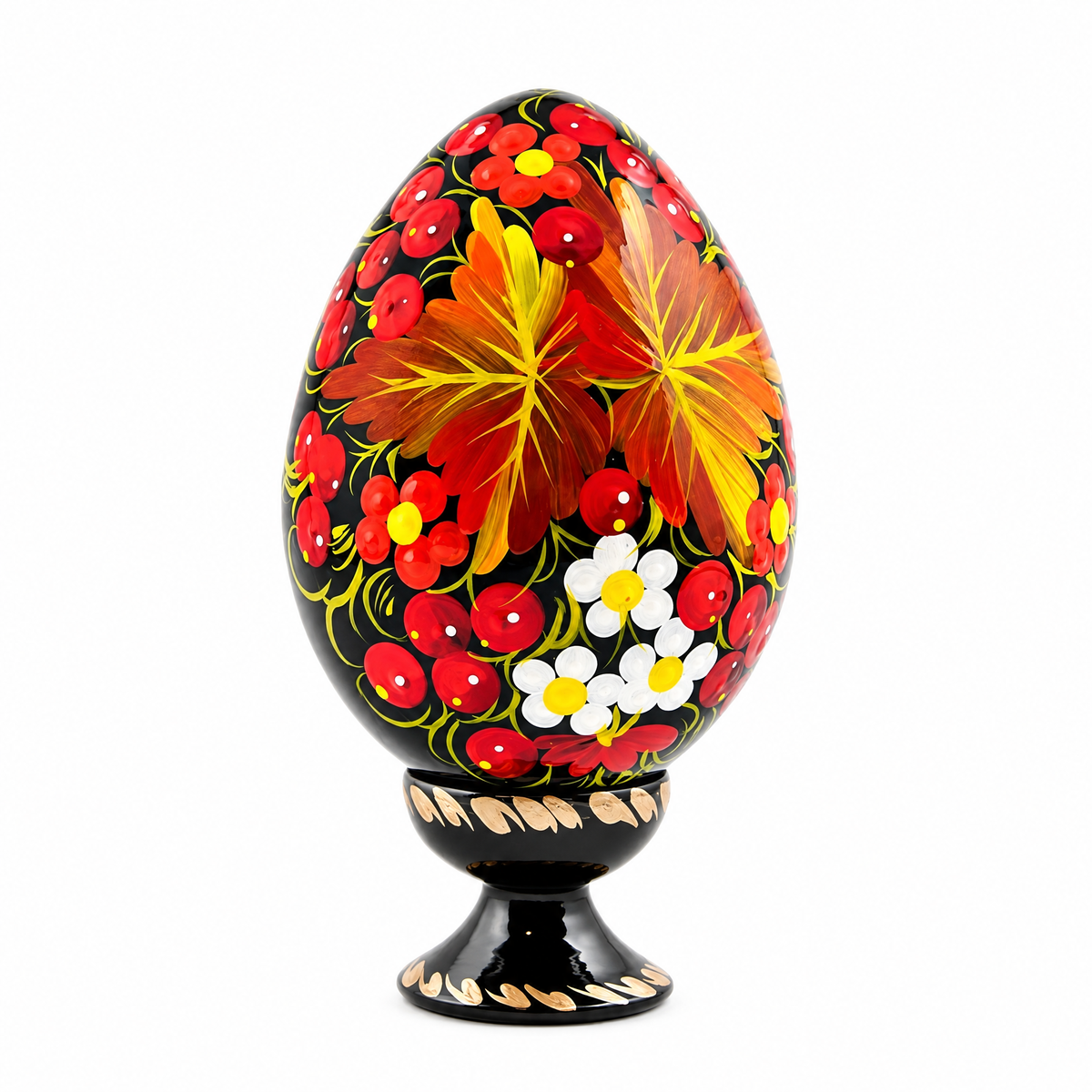 a painted egg on a stand