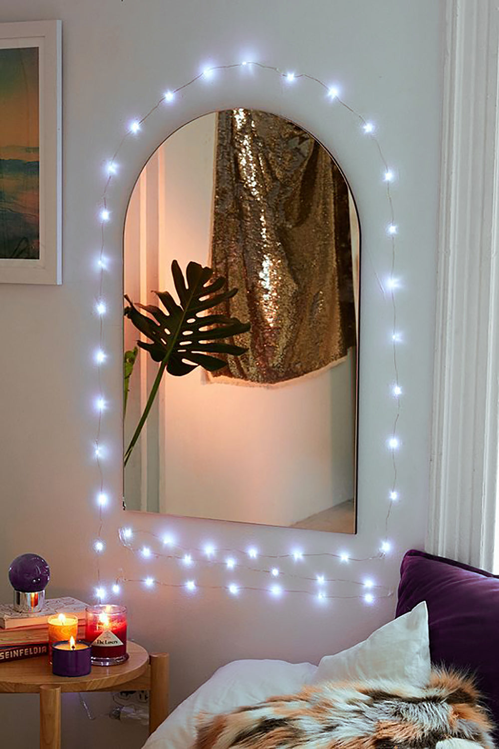 a mirror with lights on it
