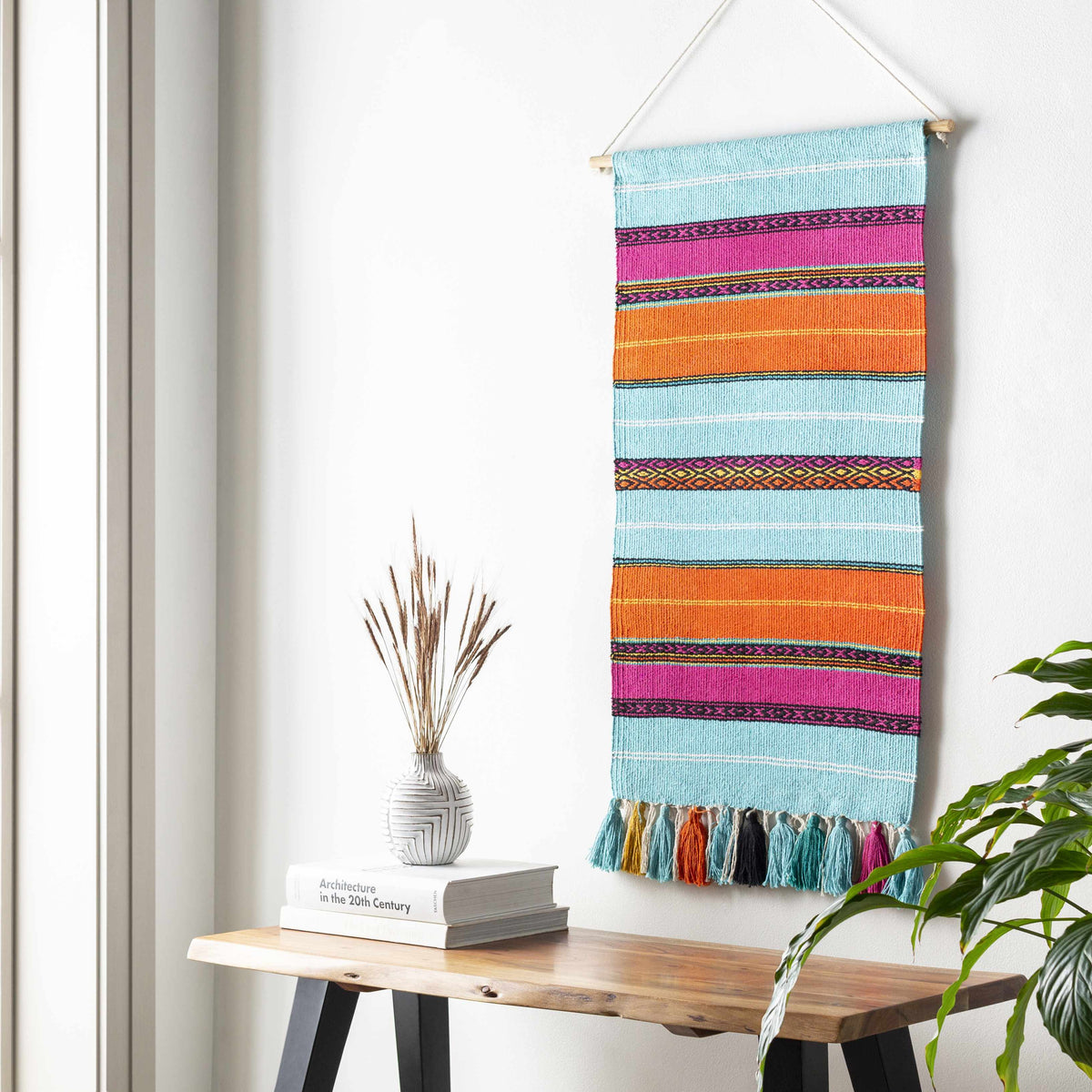 a colorful towel on a wall
