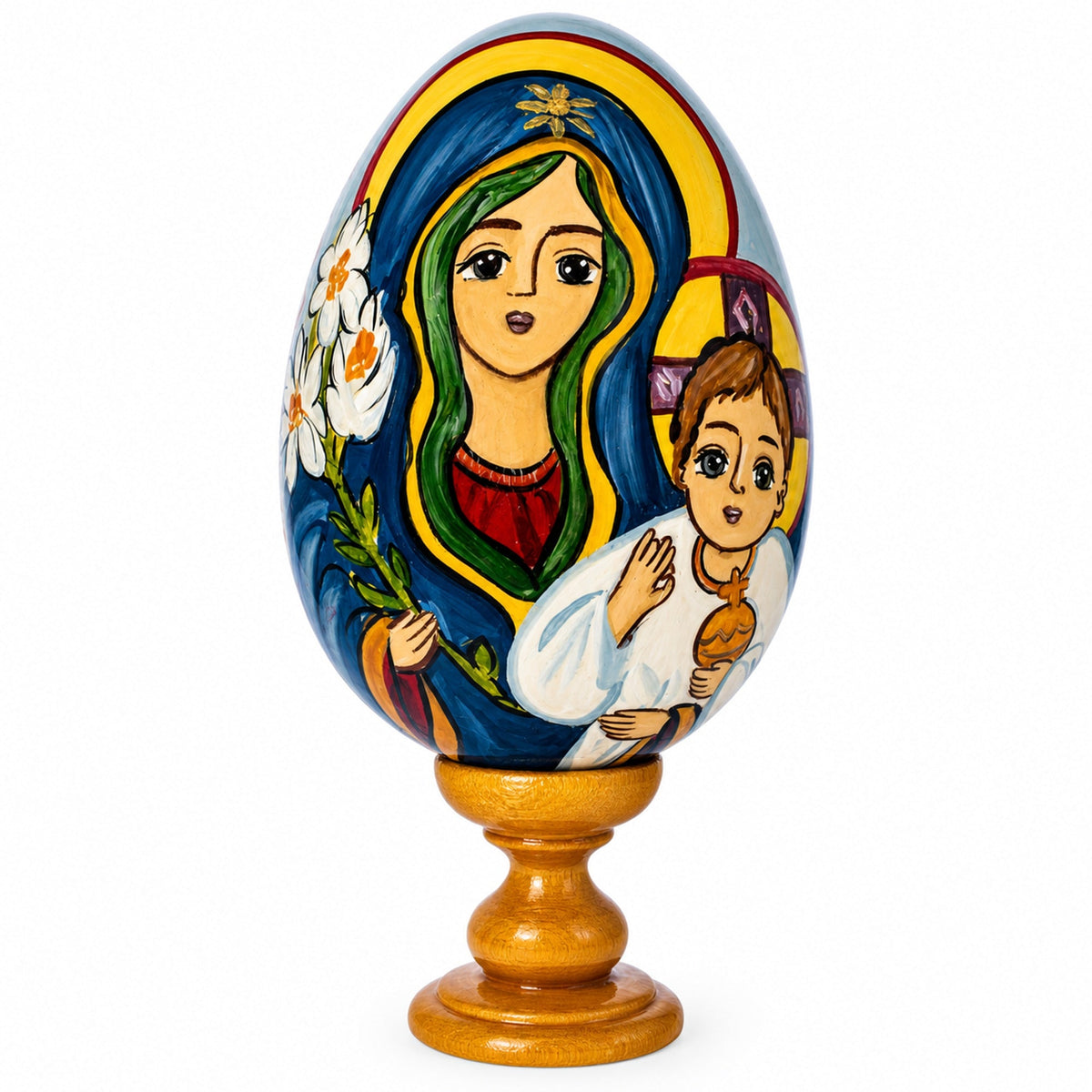 a painted egg with a child and a woman