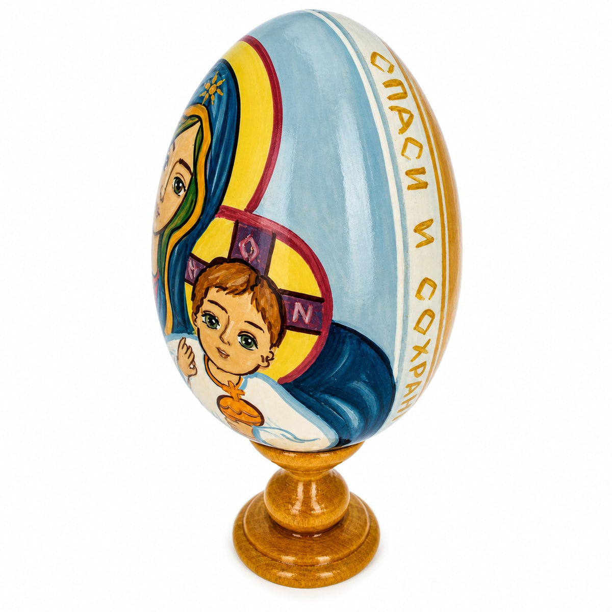 a painted egg with a child on it